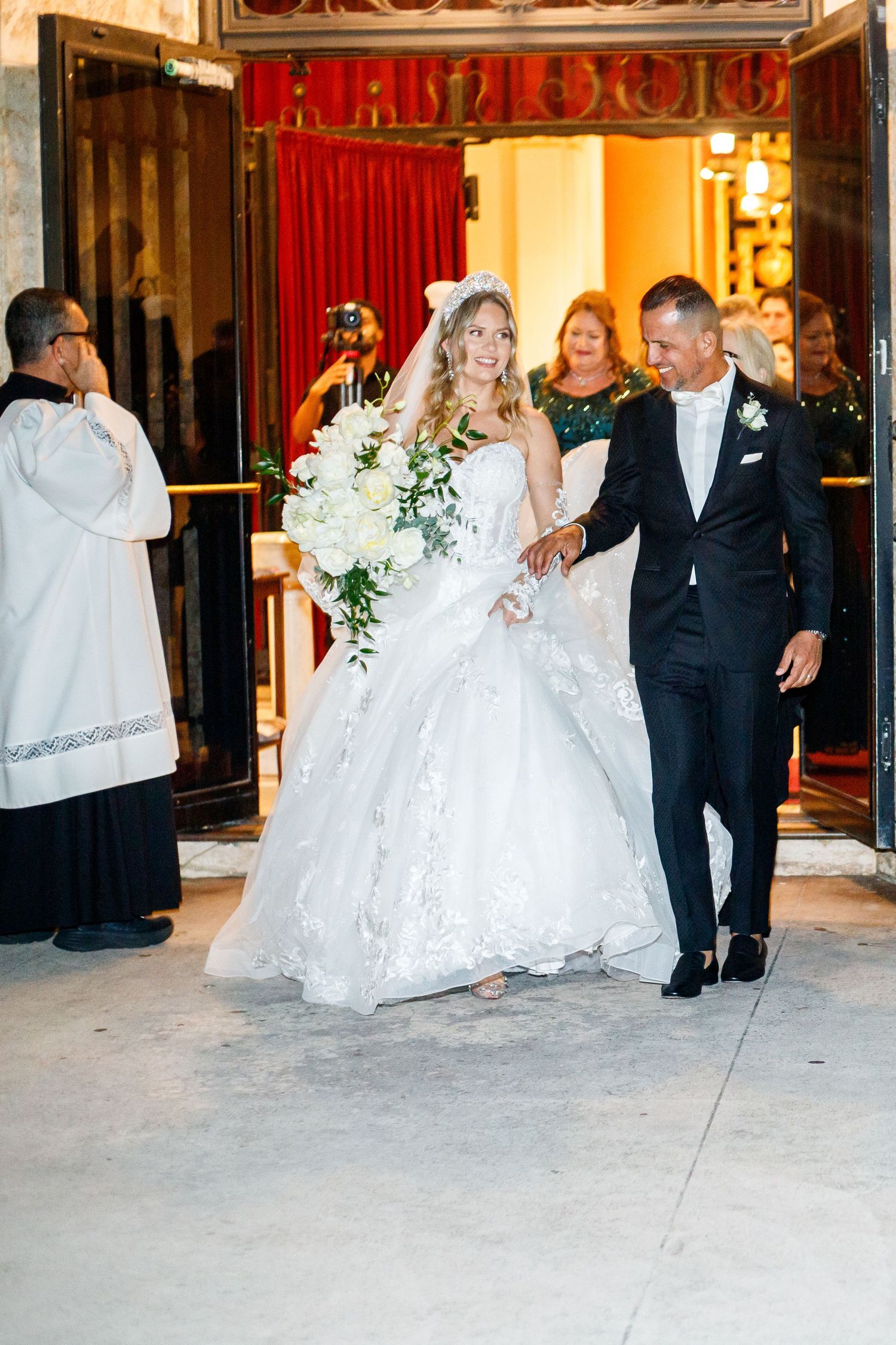 A series of wedding photos showing couples dancing and walking together in an elegant venue with red decor.