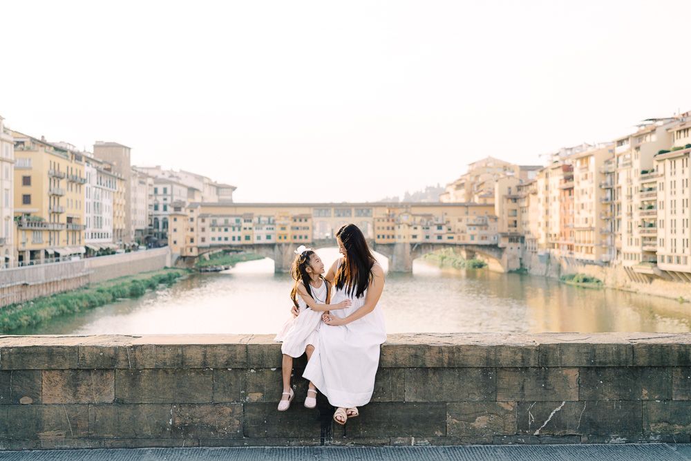 mother daughter hug in florence at Ponte Vecchio at sunset