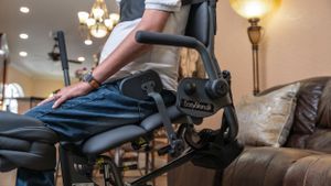 Detail shot of adaptive exercise equipment controls and support mechanisms.