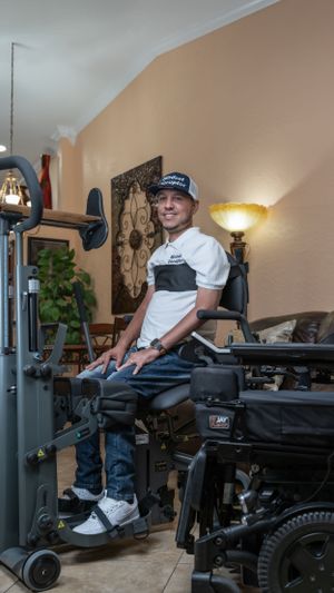Full view of person using specialized workout equipment in home fitness setup.