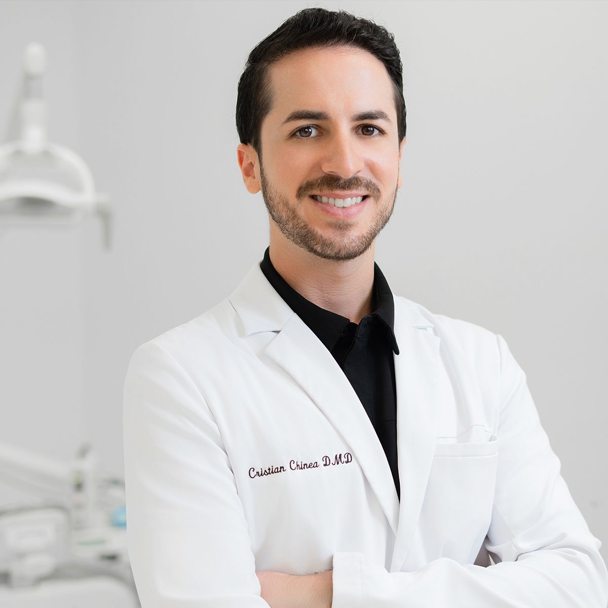 Orlando on-location headshot photographer Ray Alvarez — dentist headshot photographed in medical office setting