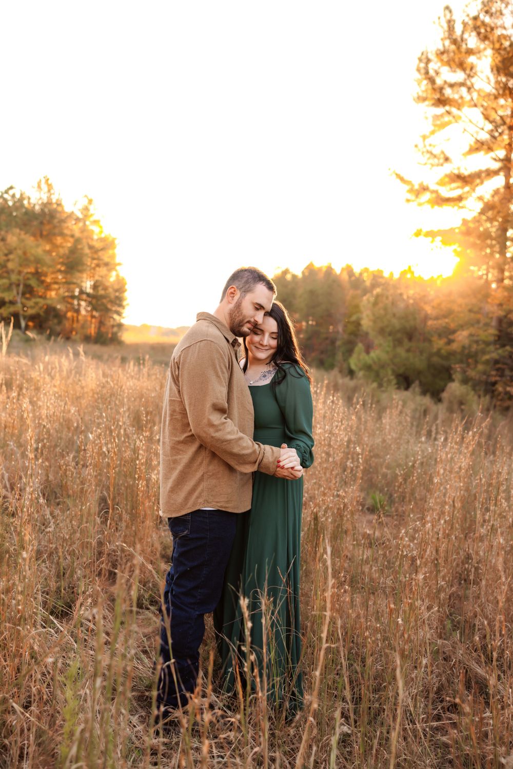 Lifestyle couples portraits in Iron Station NC with natural backdrops