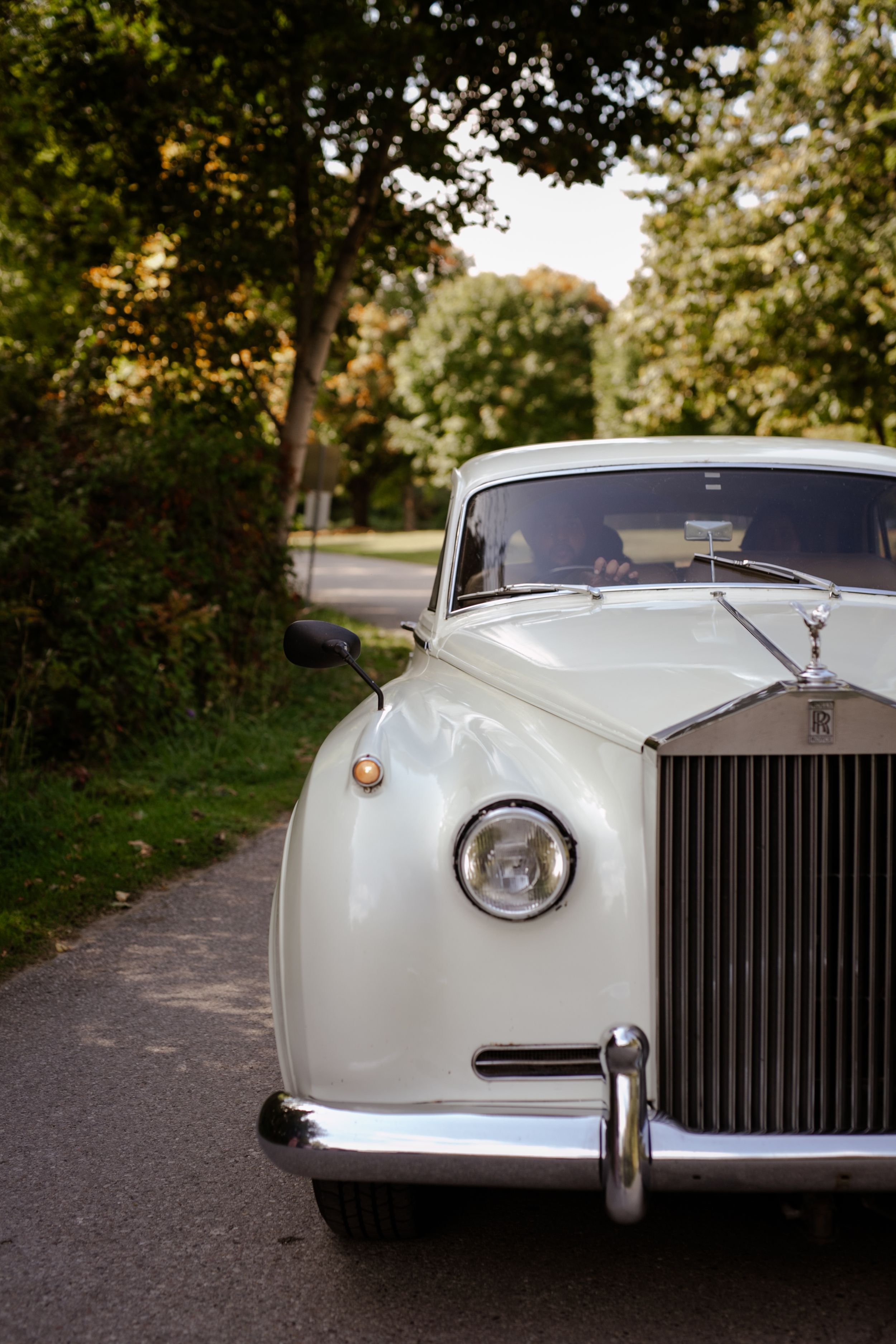 Rolls Royce at wedding. Photography by Samantha Bateman.