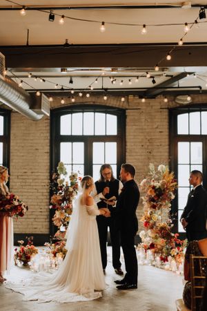 Couple in wedding ceremony. Wedding photography by Samantha Bateman.