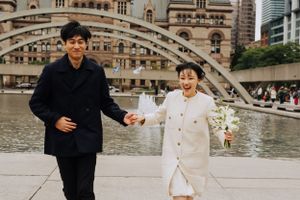 Bride and groom eloping at City Hall in Toronto, Ontario. Wedding photography by Samantha Bateman.