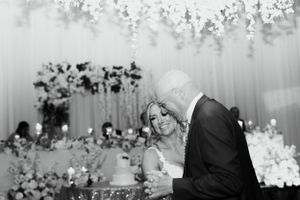 Bride dancing with father at wedding reception. Wedding photography by Samantha Bateman.