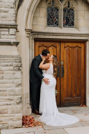 Bride and groom kissing. Wedding photography by Samantha Bateman.