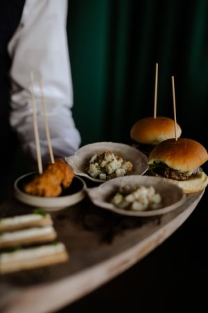 Hamburgers at wedding reception. Wedding photography by Samantha Bateman.