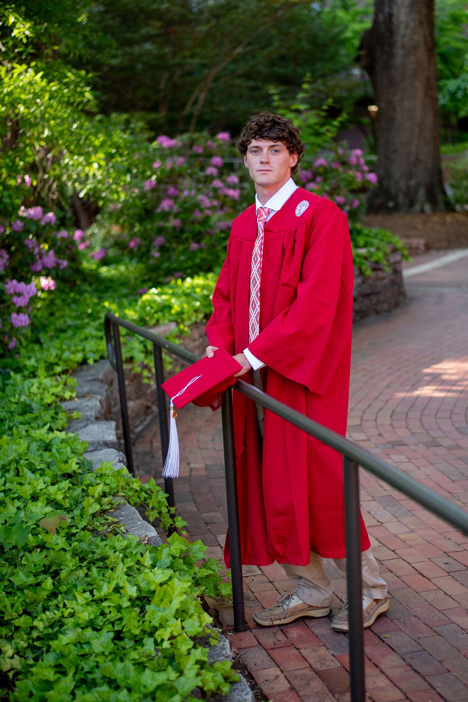 NC State Graduate on campus for his grad images
