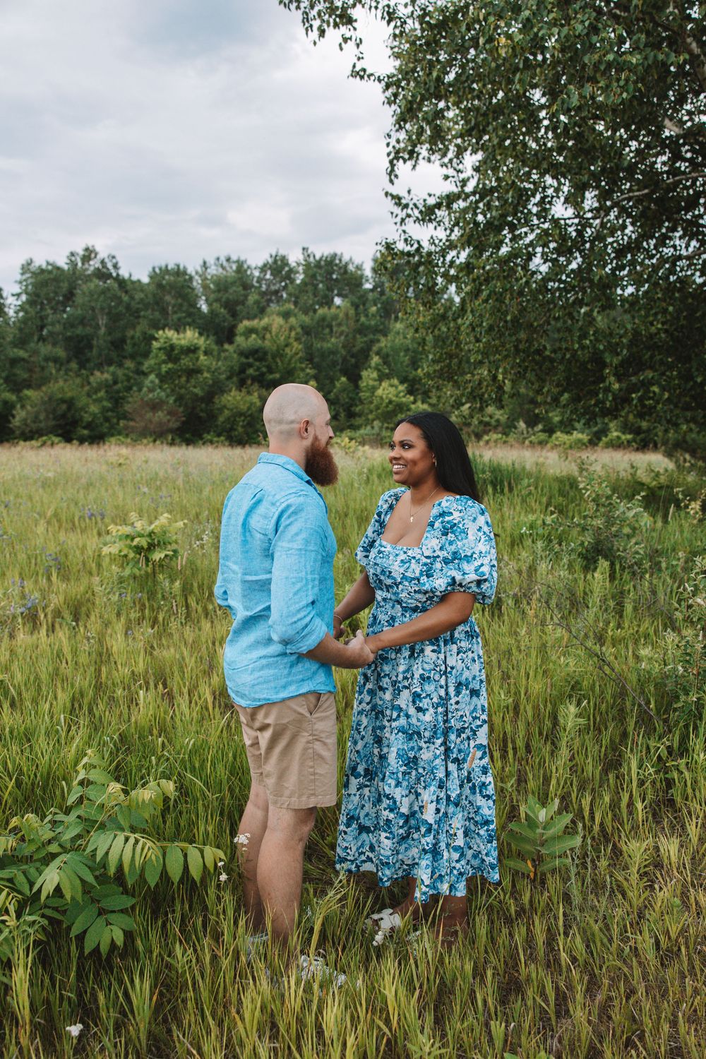Engagement session in wildflower field—outdoor couple photography by Carson Suttle Photography