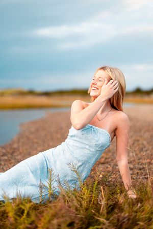 Candid portrait of a King Philip High School senior at Rexhame Beach in Marshfield MA