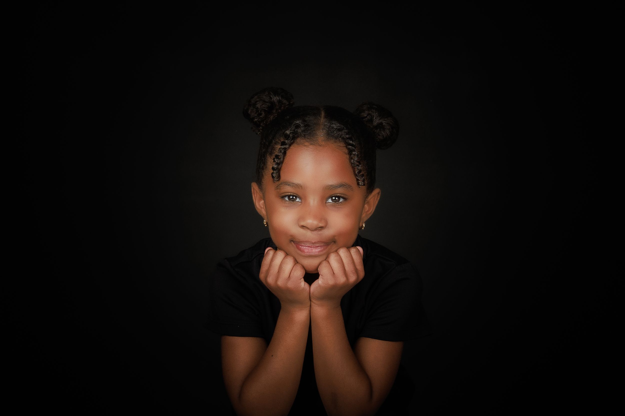 A series of six dark-toned portrait photos showing different expressions and poses against a black background.