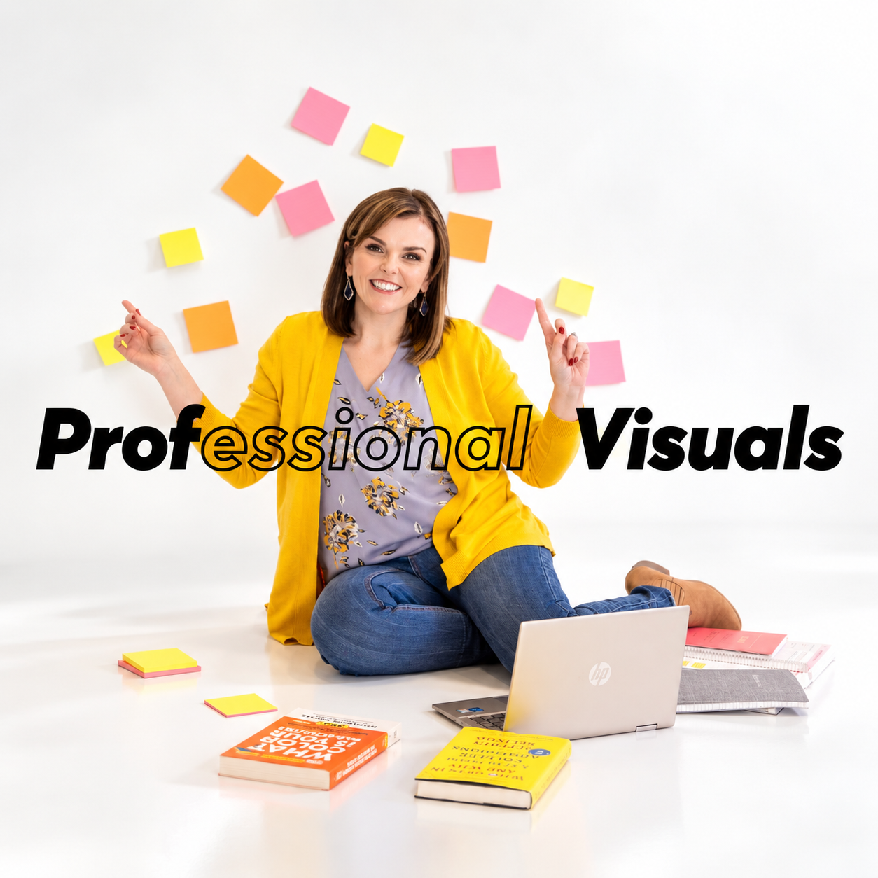 Woman in yellow cardigan sits on floor with laptop, books, and sticky notes for Professional Visuals branding.