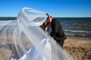Stunning wedding moments on the beach here in Shell Lake, Wisconsin
