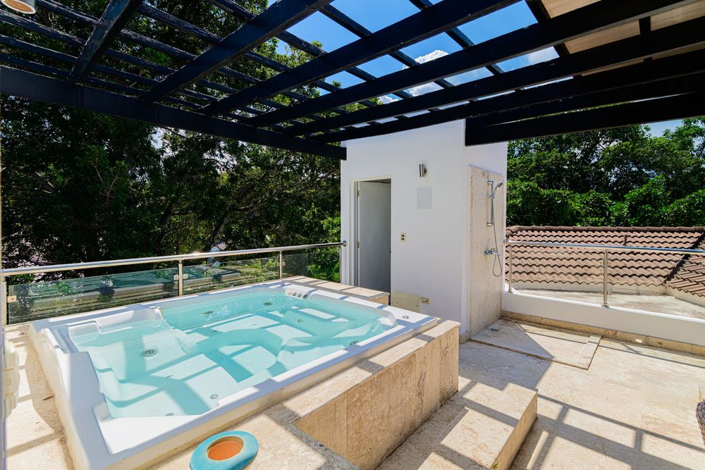 Buying opportunity Sosua villa with rooftop jacuzzi, private lounge, and ocean view, real estate photography