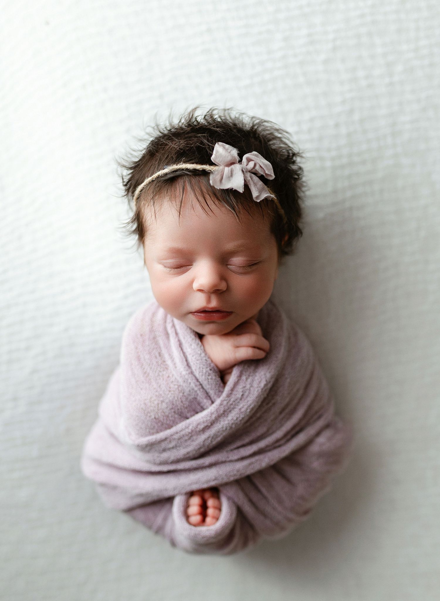 Newborn girl in purple wrap. Greenville, SC newborn photographer, Easley, SC newborn photographer, Upstate, SC newborn photographer.