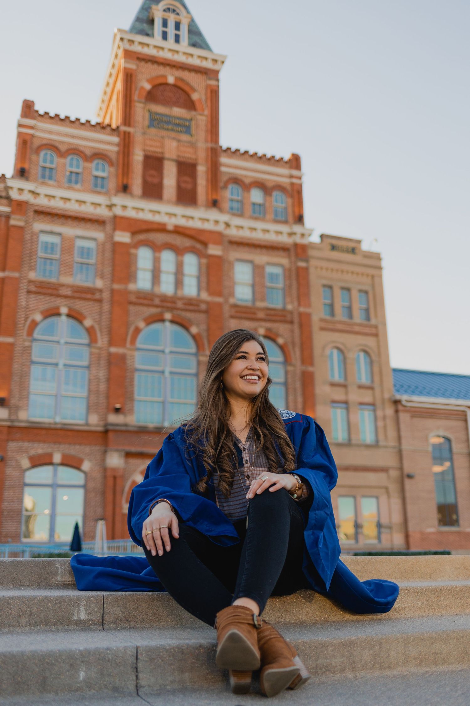 Boulder Senior Photographer captures a beautiful college graduate in front of the Tivoli on MSU Denver's campus