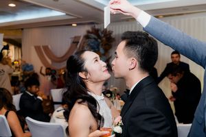 Bride and groom sharing a romantic dance at their elegant wedding reception.