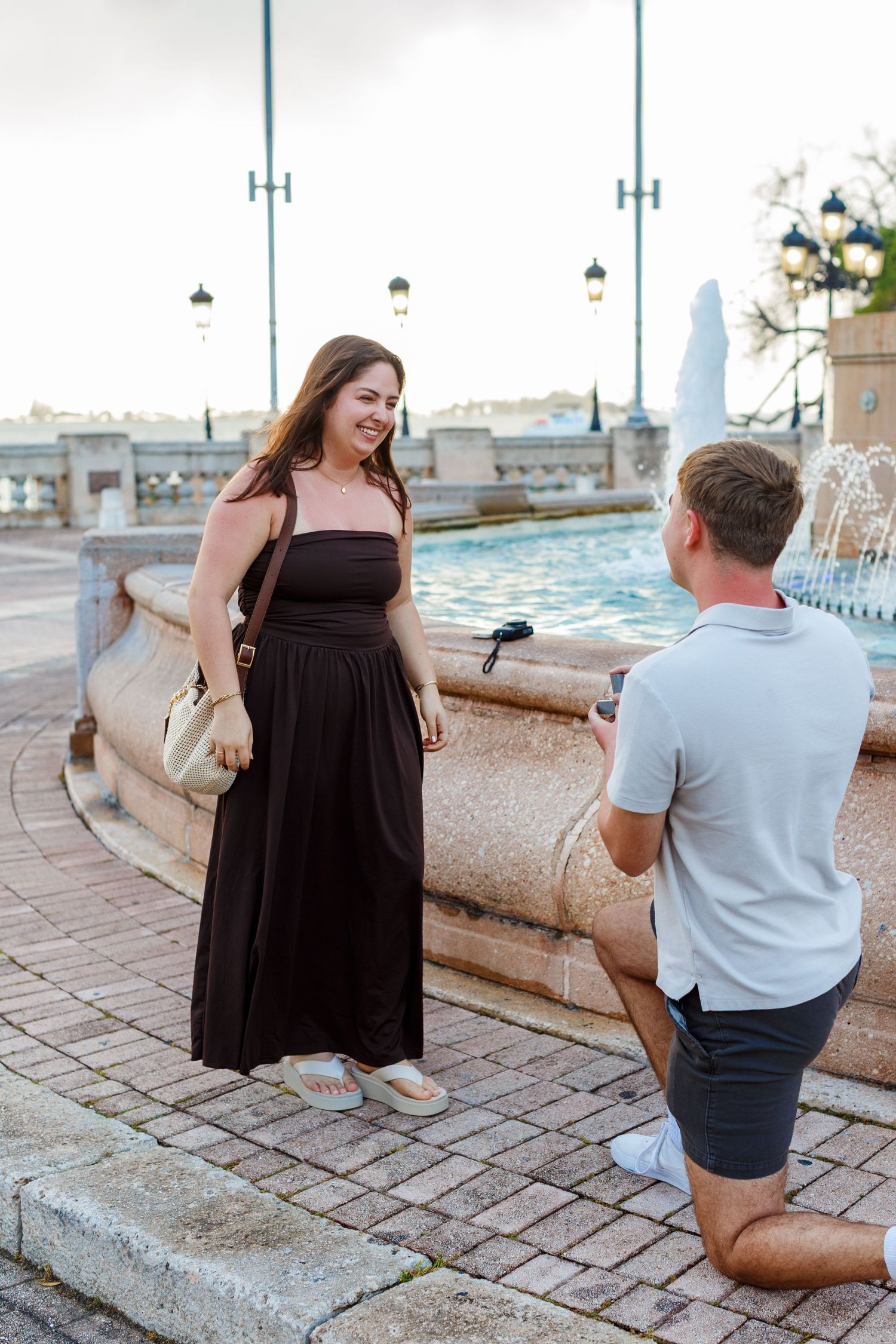 Couples portrait. Marriage proposal at Fuente Raíces in Old San Juan, Puerto Rico.
