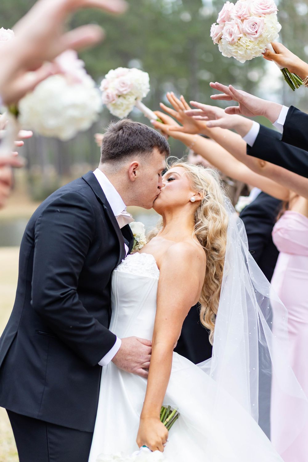 bride and groom kiss