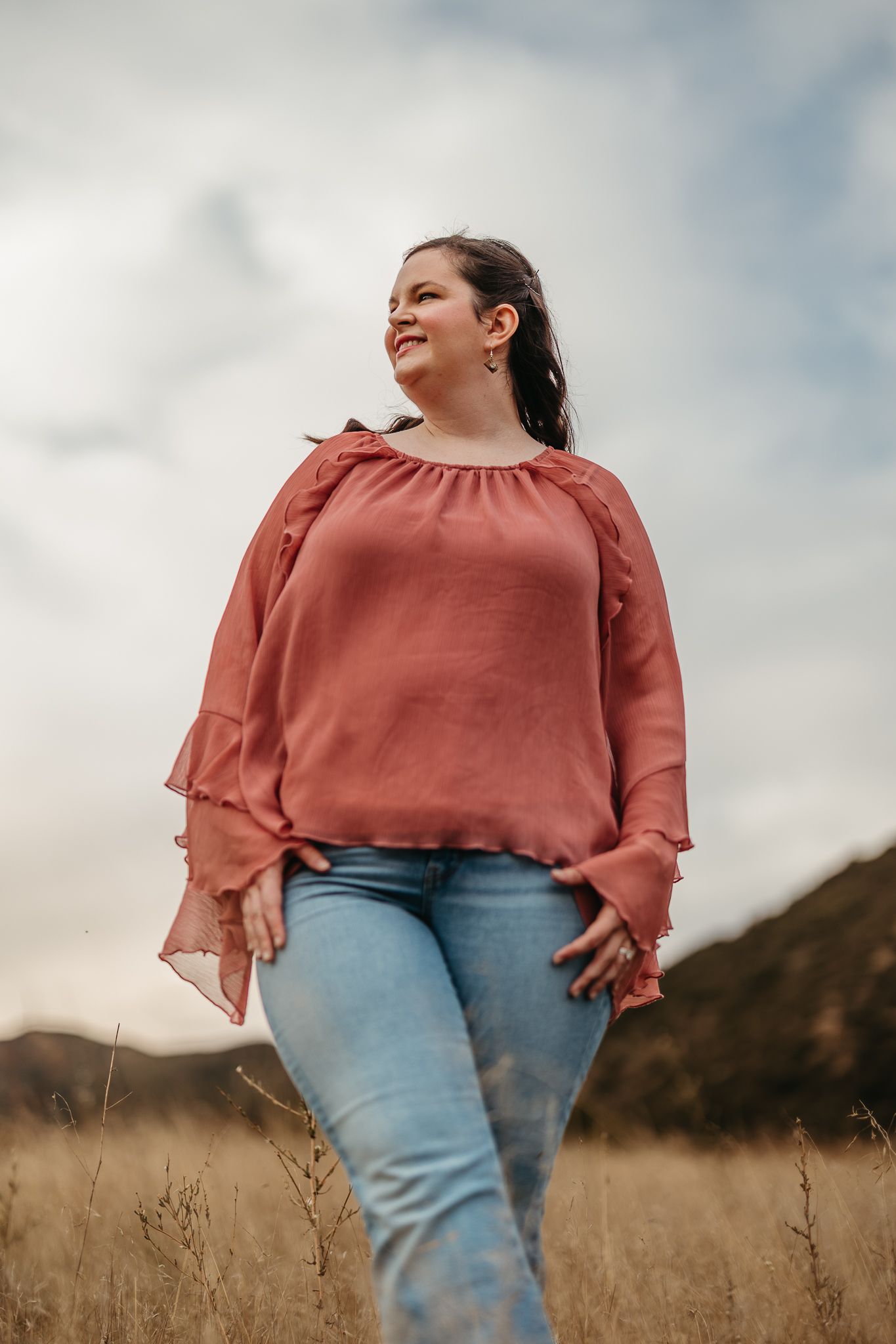 Woman looking off into the distance.