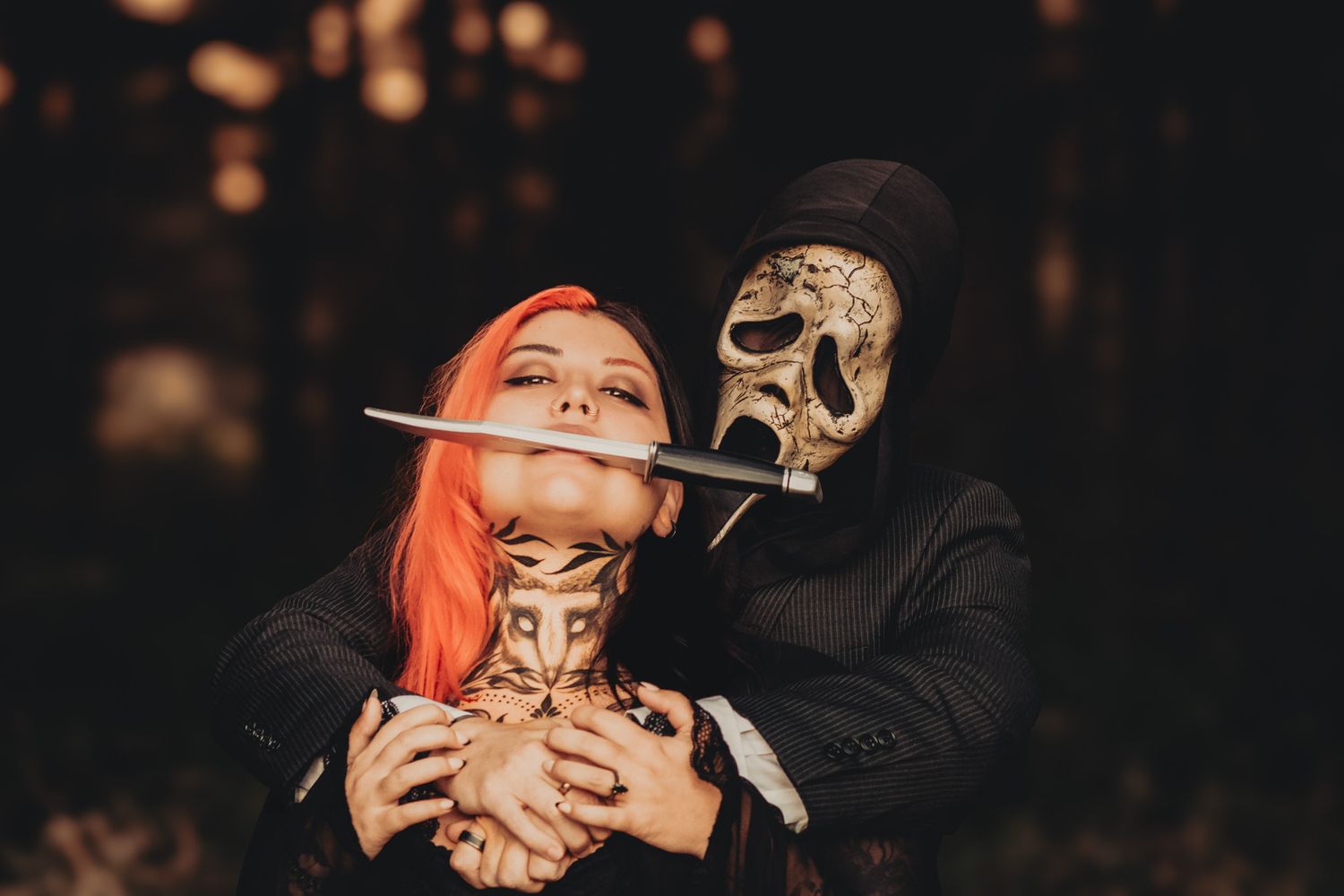 Dark and moody photo series showing hands holding a skull prop against a black background with warm bokeh lighting effects.