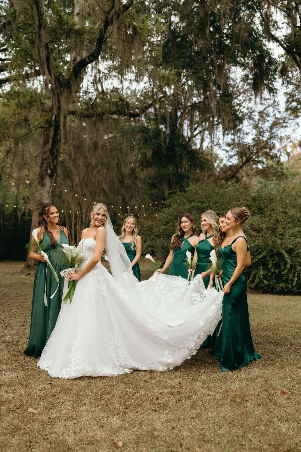 Bride poses with bridesmaids in Coosada, Alabama