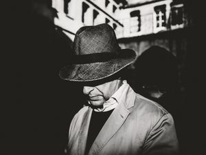 An art patron browsing a gallery in Le Marais, Paris, France. 2024