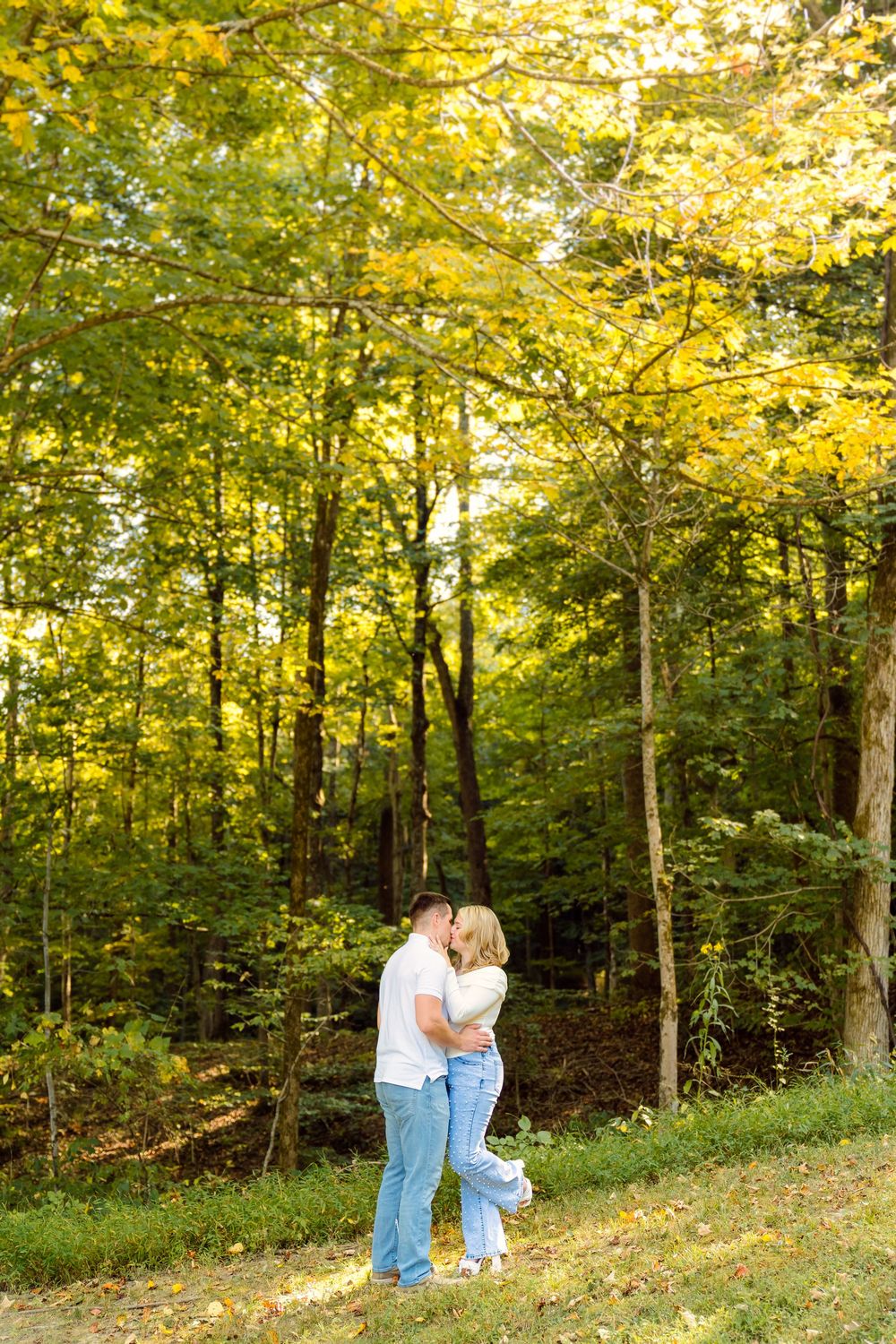 Maggie & Andrew's golden hour engagement at The Hangar wedding venue in Hocking Hills in Logan Ohio. Cincinnati Wedding Photographer