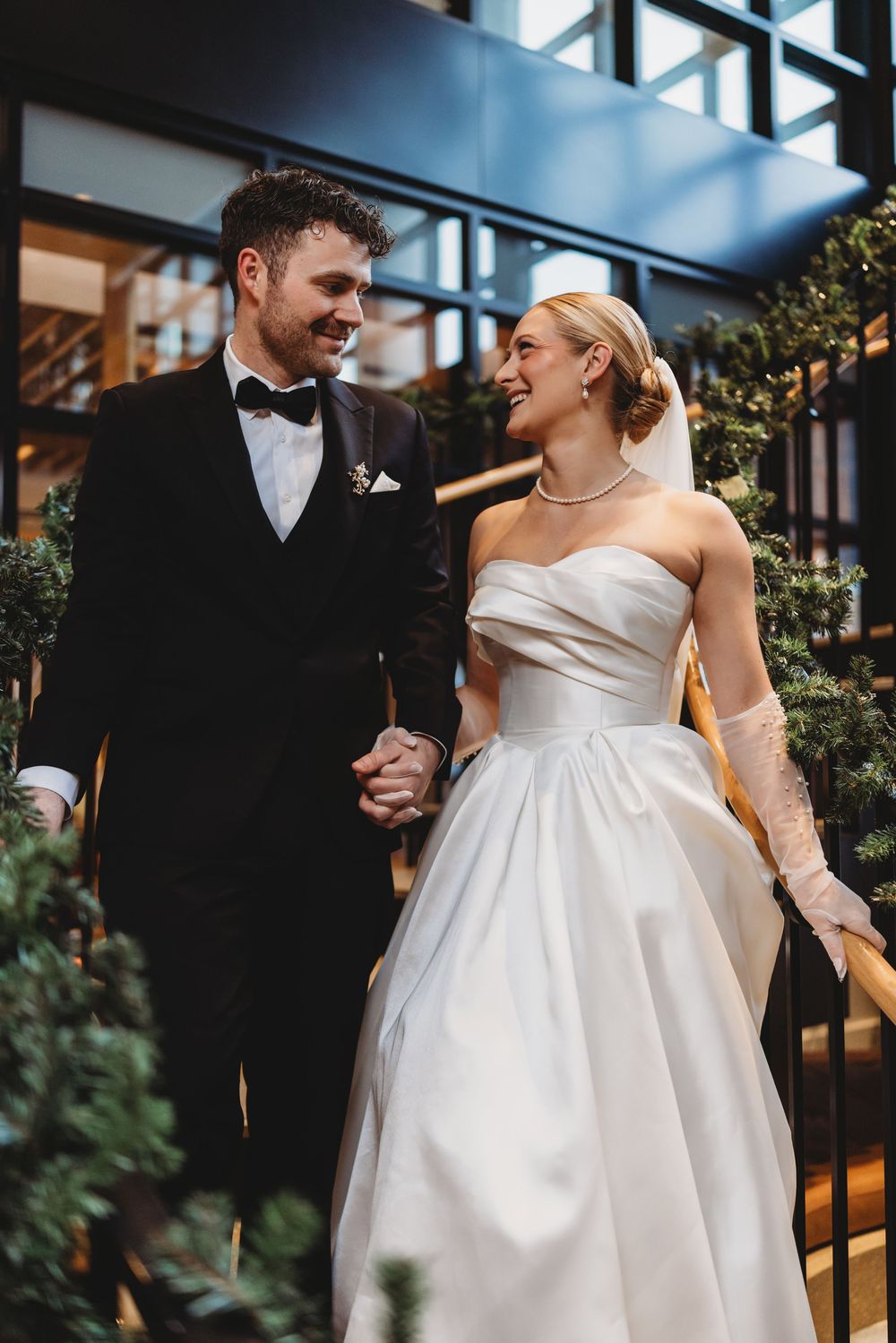 Elegant couple in formal wedding attire share intimate moments in a series of romantic outdoor portraits.