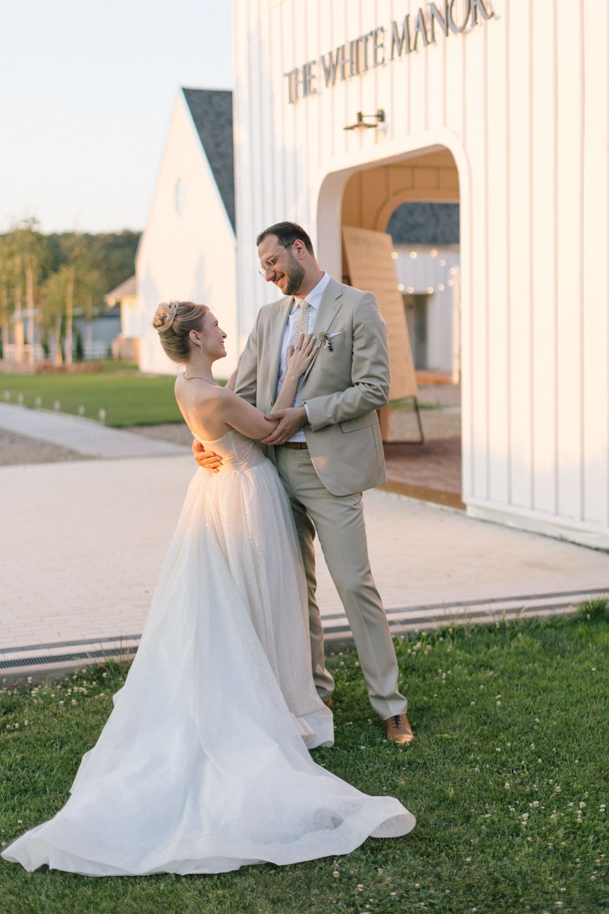 A romantic wedding portrait captured outside The White Manor venue.