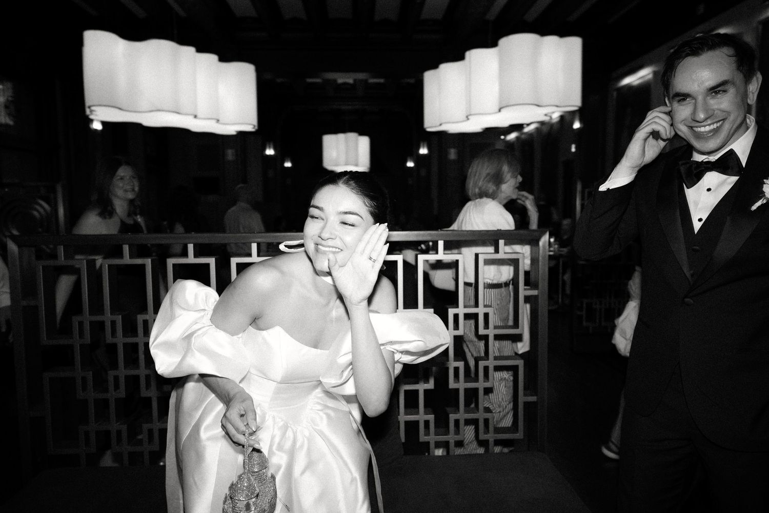 Black and white photos showing a couple dancing and celebrating at what appears to be a vintage wedding reception.