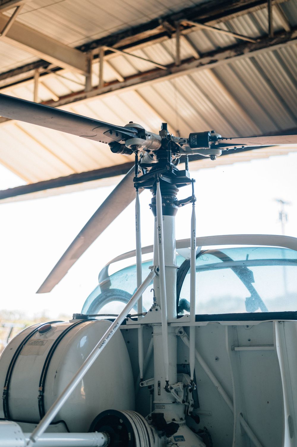 Close-up view of a small aircraft's overhead control panel and instruments in a cockpit.