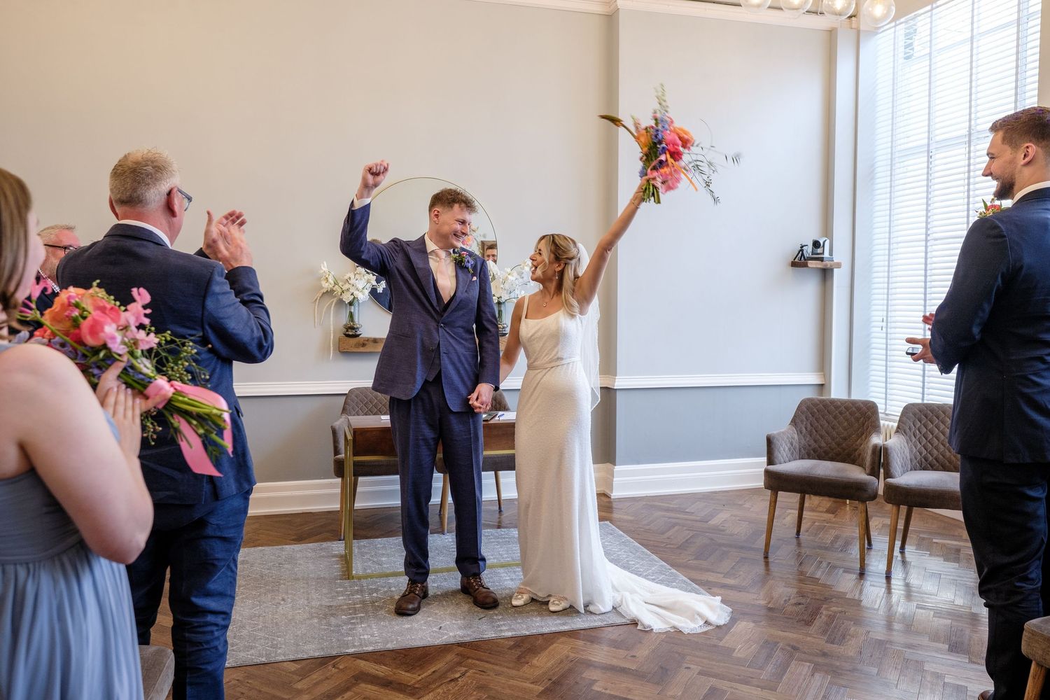 Newlywed couple in Room 99 at Islington Town Hall
