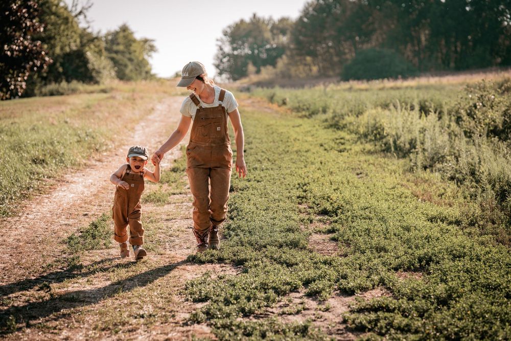 Mother and son celebrating a second birthday on a family farm in Mount Albert, Ontario.