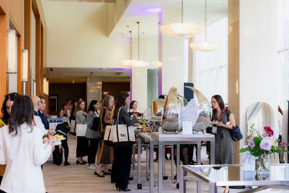 A series of wedding reception photos showing guests mingling in an elegant venue with purple lighting accents.