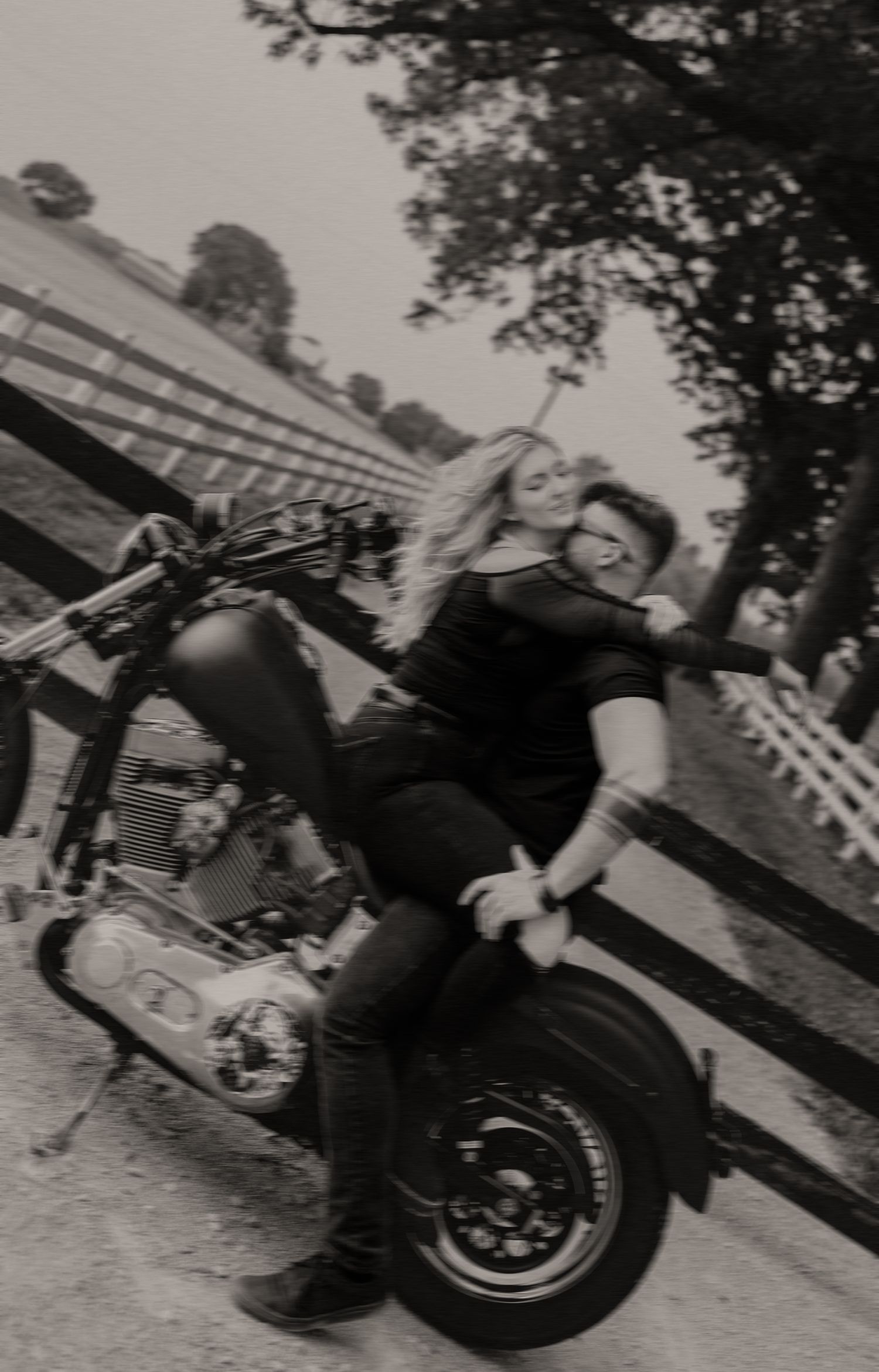 A vintage black and white photo series showing a motorcycle stunt sequence.
