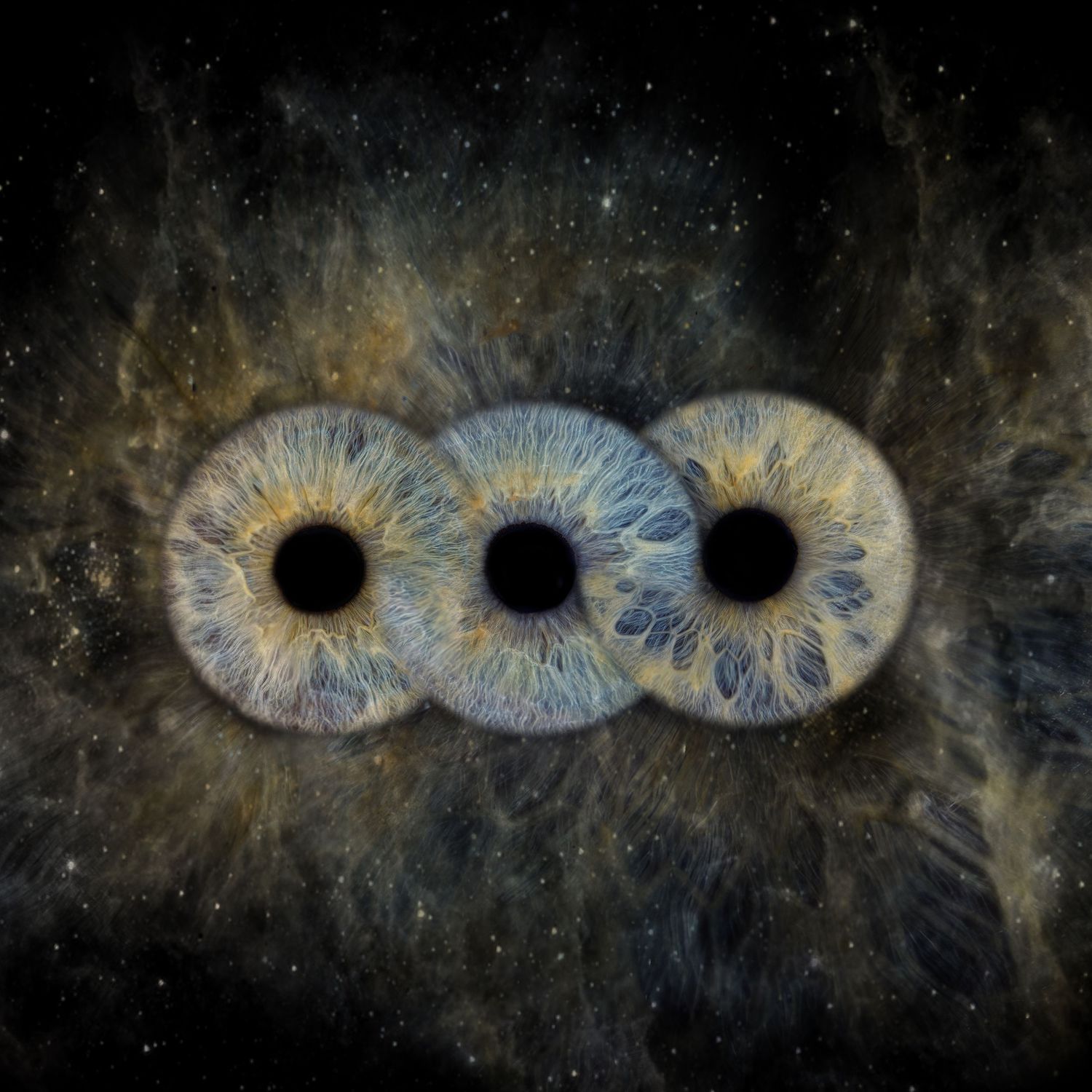 Three blue iris patterns arranged horizontally on a dark cosmic background with golden nebula effects.