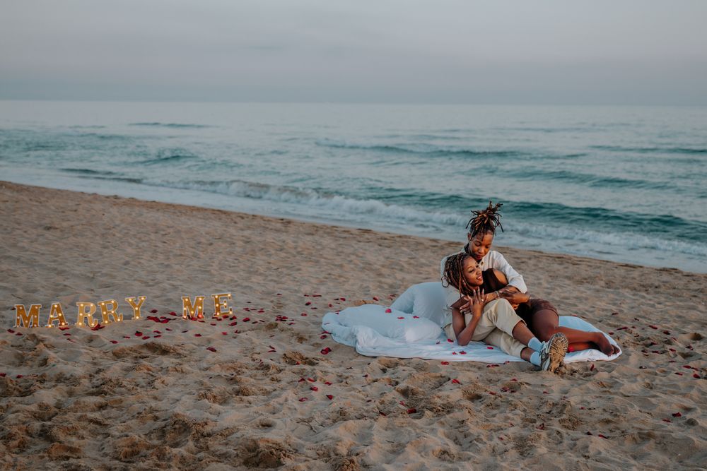 Intimate beach moment between two women