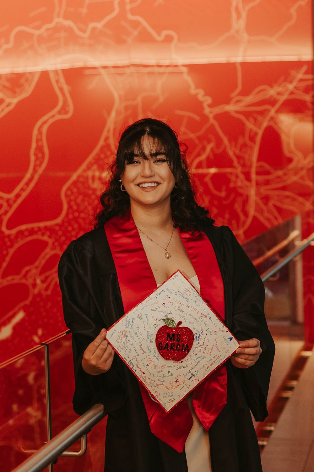 Graduation photos on EWU campus in Cheney, WA with emotional storytelling elements inside of Eastern Washington University PUB