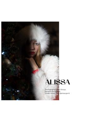 Fashion magazine cover featuring winter fashion with fluffy white fur hat and coat against dark background.