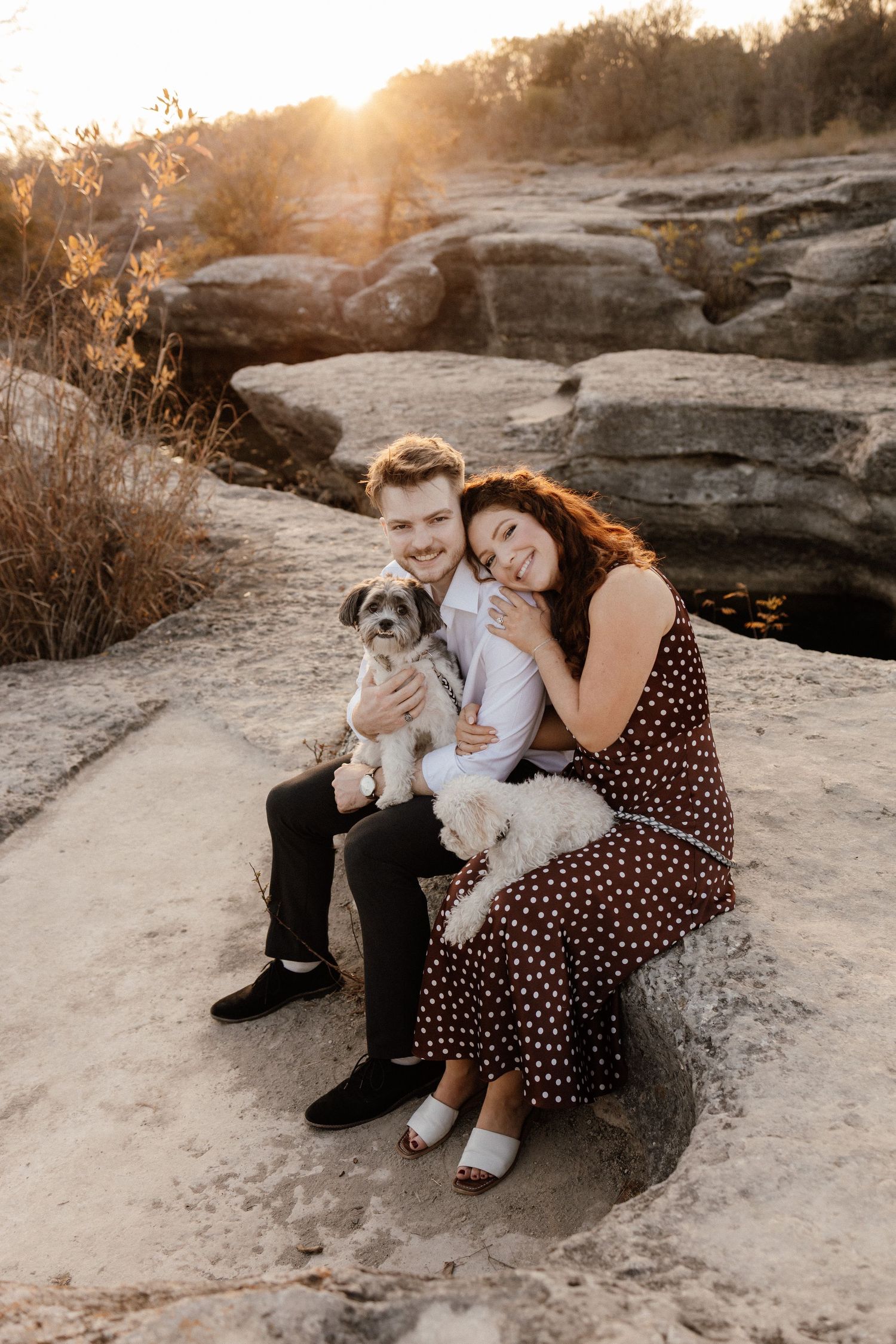 Dreamy storytelling session couple with puppy at Lake Wichita, natural sunset tones.