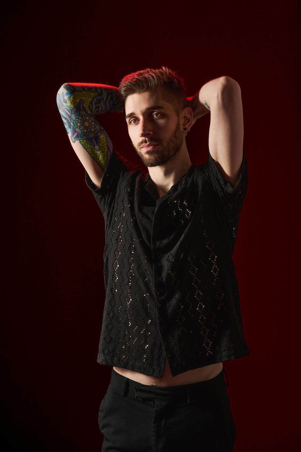 Figure in black sleeveless top poses dynamically against dark background in series of connected motion shots.