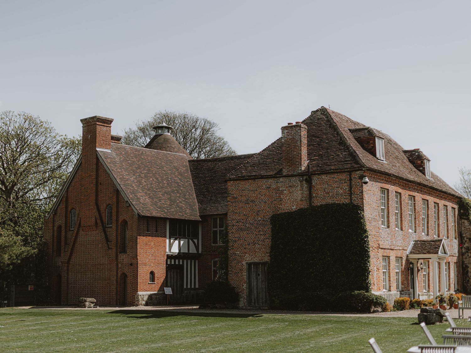 Panoramic view of traditional brick buildings and architecture at a wedding venue.