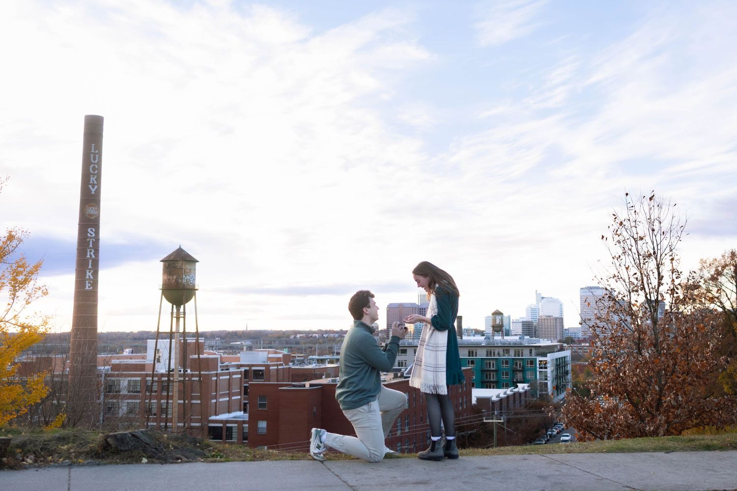 Engagement Session at Libby Hill Park in Richmond, Virginia with city in the background.