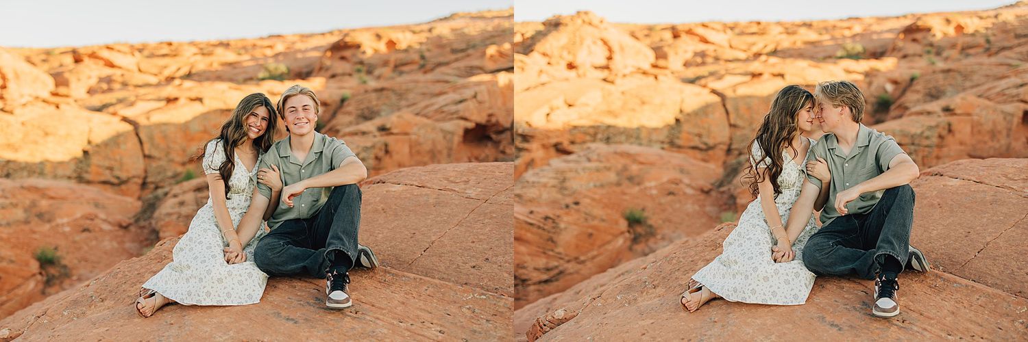 Couple sitting closely together on red desert rock, sharing a tender moment at golden hour.