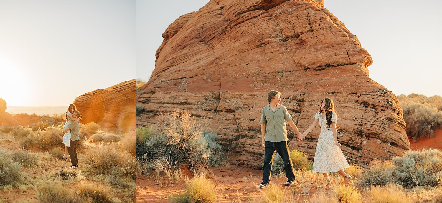 Couple holds hands at sunset near red rock formations in a desert landscape with golden light.