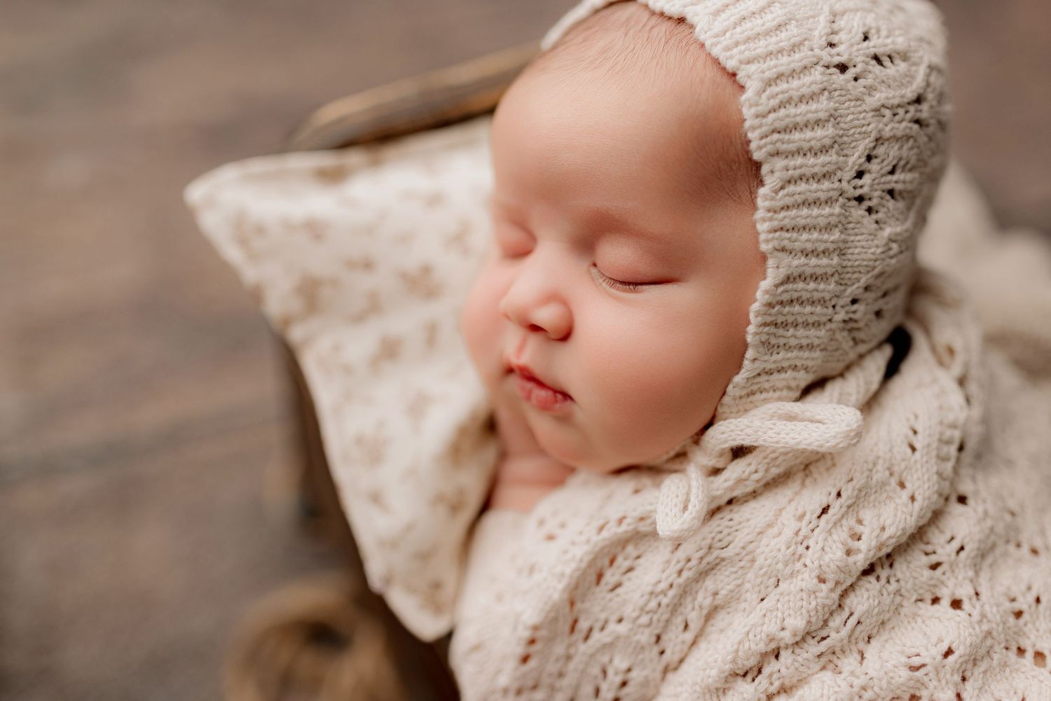 Baby girl in Tiffany Bergamino Photography's newborn photography studio in Marion, Indiana