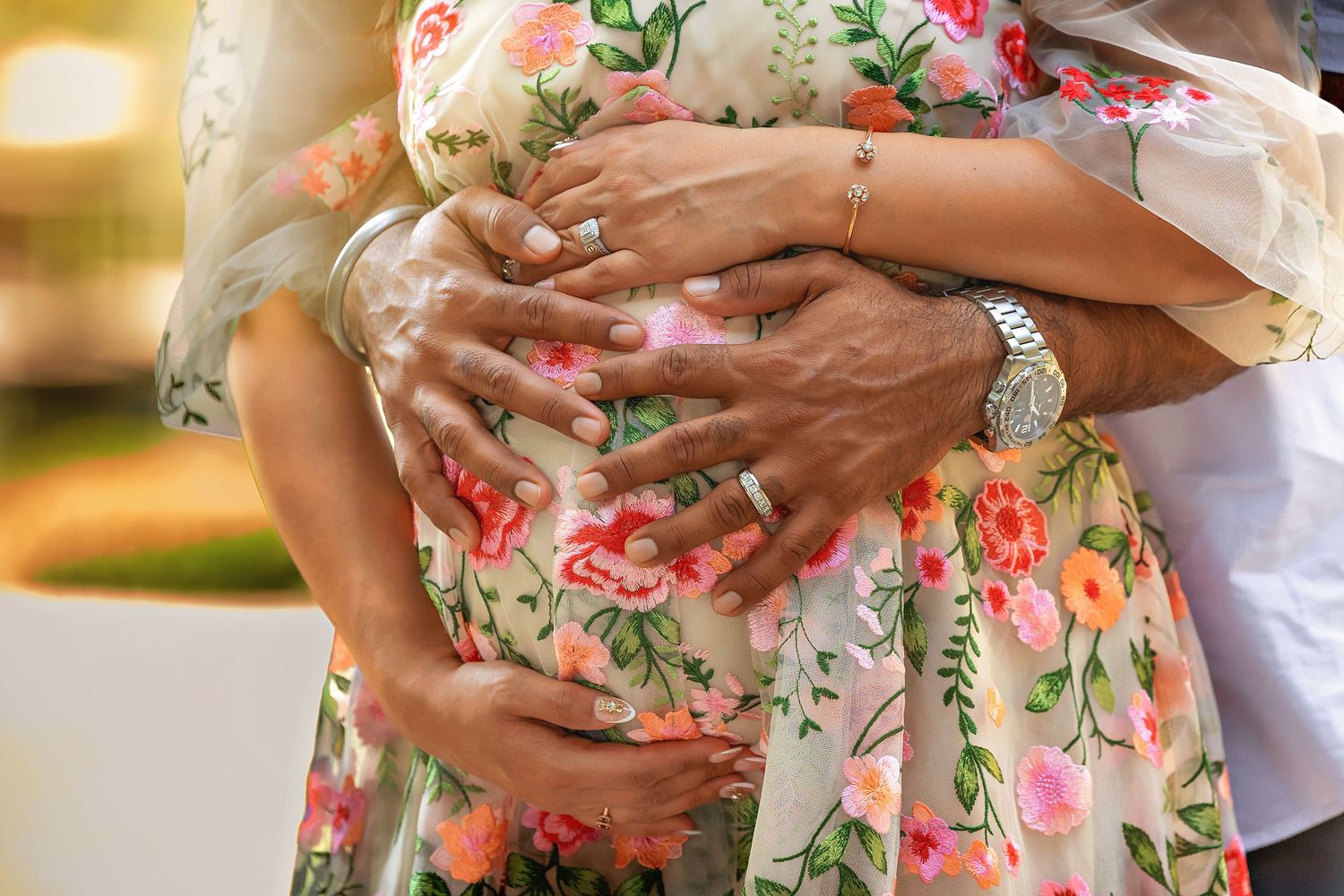 colibri captures capturing new parents to be in Fresno's Shinzen Japanese Gardens in beautiful golden natural lighting.