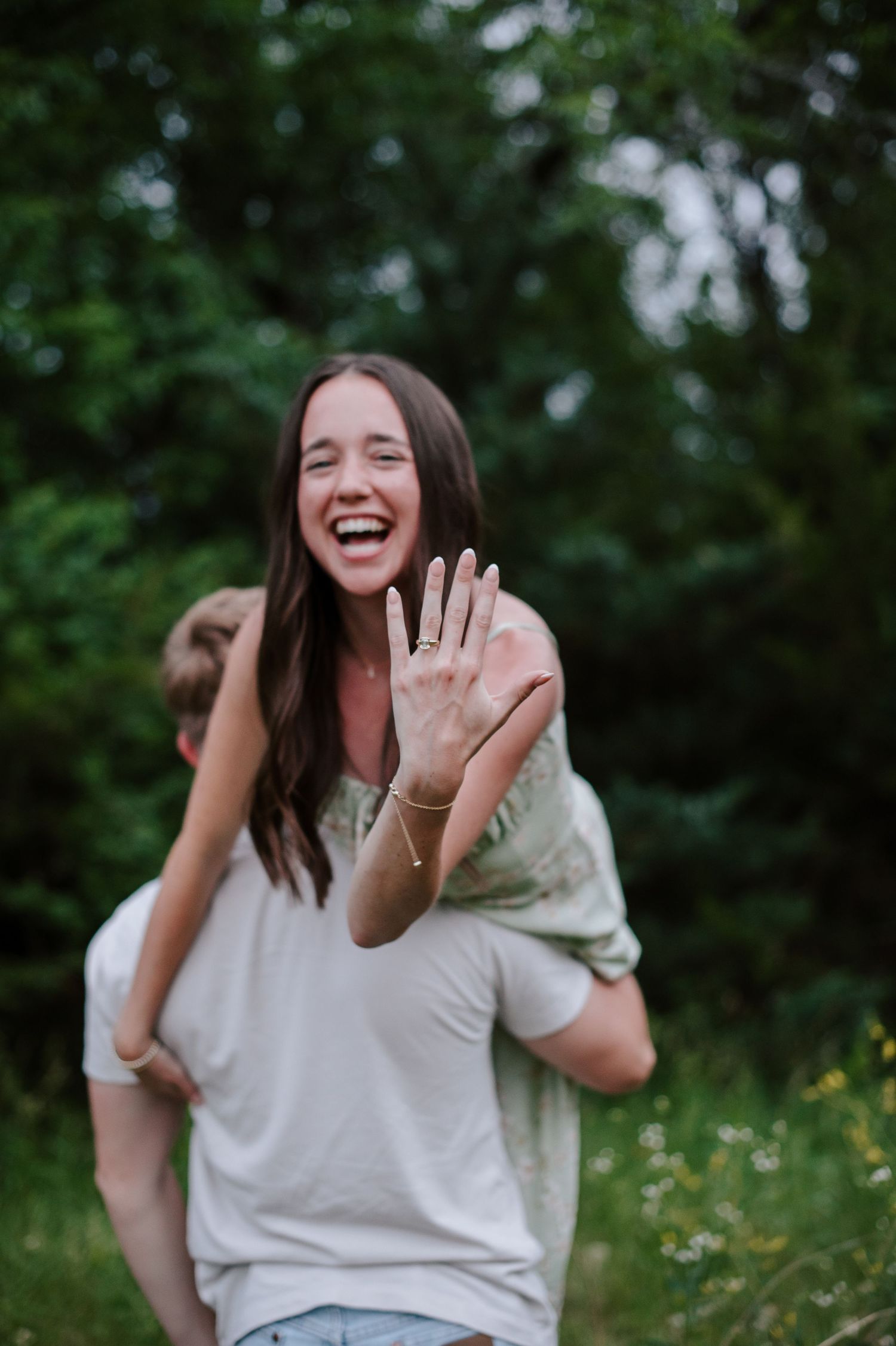 Wichita KS outdoor engagement photos in nature location Andover, couple photos in field with flowers, small elopement wedding photographer